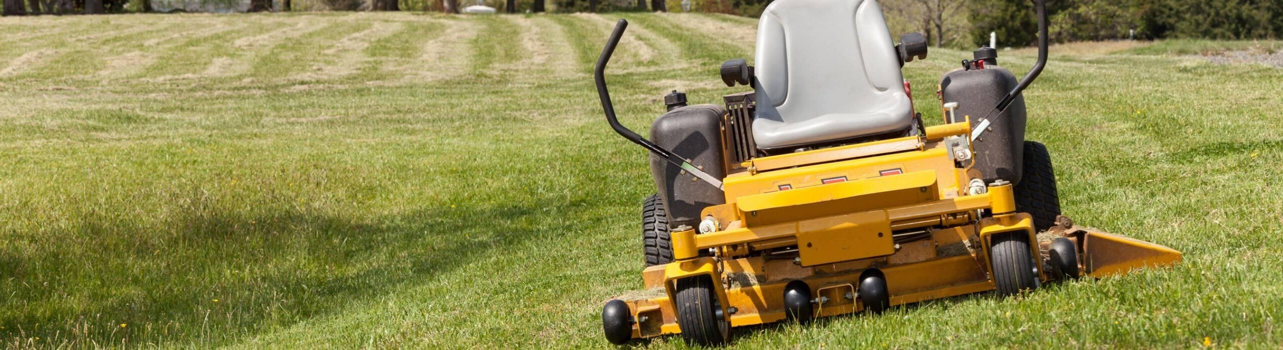 Lawn tractor on green lawn